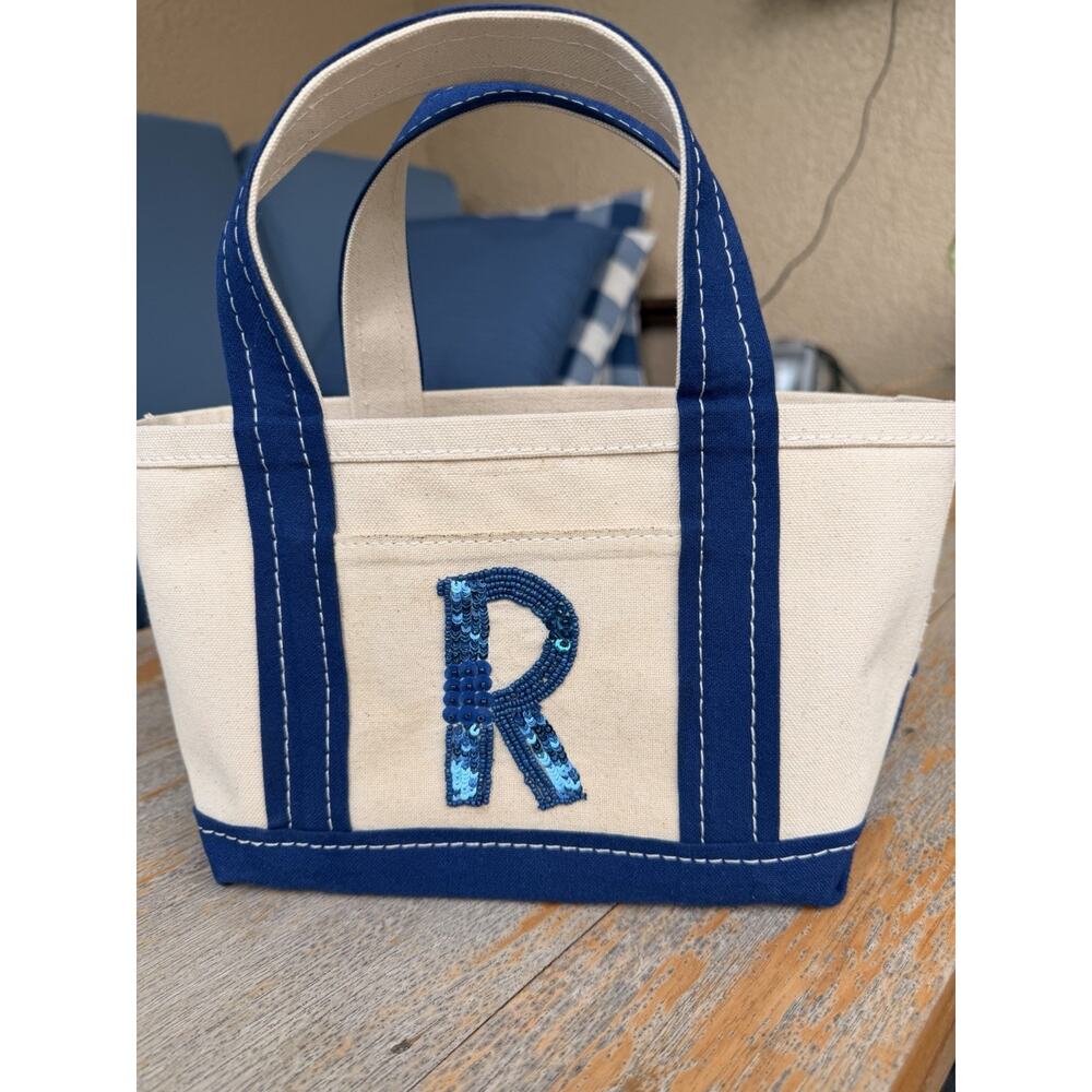 Anthropologie Cream Canvas Tote with Navy Handles and Sequin Initial R
